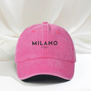 Detail of pink washed cotton baseball cap with MILANO ITALY print and metal eyelets
