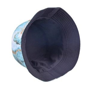 Detail of reversible sun bucket hat with blue marble pattern and black lining side