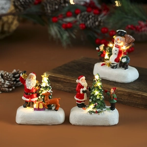 Figurines de Noël lumineuses en résine avec Père Noël et renne sur socle en bois