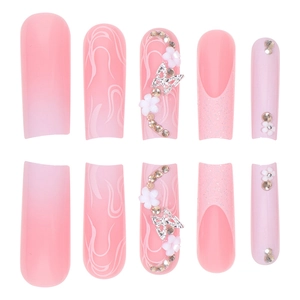 Pink gradient long press-on nails set with 3D white flowers and sparkling rhinestones