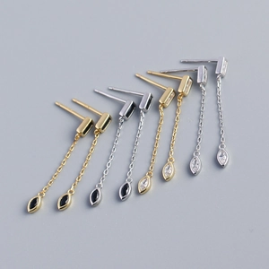 Macro view of S925 sterling silver rectangular earrings with marquise tassel chain