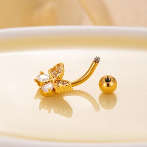 Golden butterfly belly button ring with white zircon stones and curved stainless steel bar