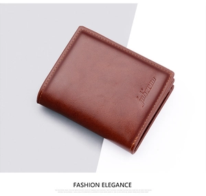 Close-up of brown textured leather wallet with embossed logo on a minimalist background