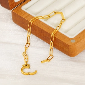 Minimalist 18K gold plated stainless steel paperclip chain bracelet with round toggle clasp