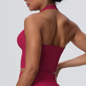 Detail of breathable halter-neck sports bra fabric and back design in dark red finish