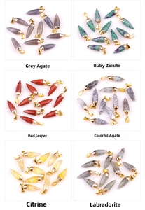 Grid view of various hexagonal bullet pendants in natural agate and citrine stones