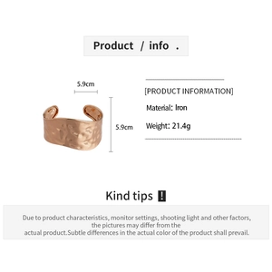 Detail showing irregular hammered rose gold iron cuff bracelet with weight and size specs
