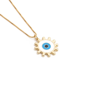 Gold-plated Evil Eye pendant necklace with blue enamel on a clean white background