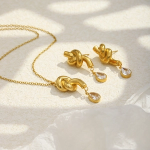 Elegant 18K gold plated knotted waterdrop jewelry set with zircon necklace and earrings