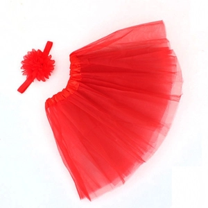 Red chiffon tutu skirt set for babies with matching floral headband on white background