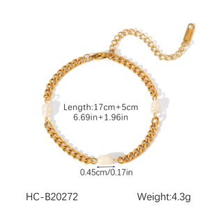 Detailed view of golden stainless steel bracelet with freshwater pearl and S.Steel stamp