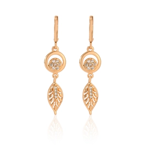 Detail of rose gold leaf drop earrings featuring zircon stones and intricate hollow design
