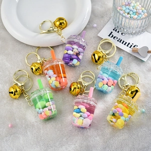 Bubble tea pendant keychains in six colors with liquid glitter and golden bells