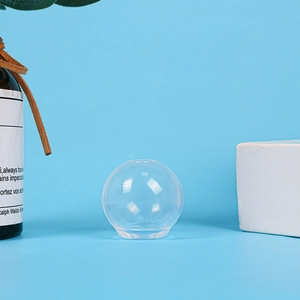 Macro detail of a high-transparency spherical resin mold with flat base for DIY jewelry