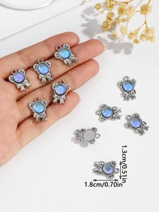Close-up of alloy bow pendant with blue opal stone and exact dimensions for DIY
