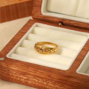 18K gold plated titanium steel ring with moon star motif and cubic zirconia in a box