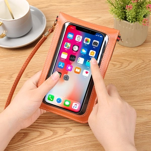 Sac à bandoulière orange en cuir PU pour téléphone avec fenêtre tactile sur table