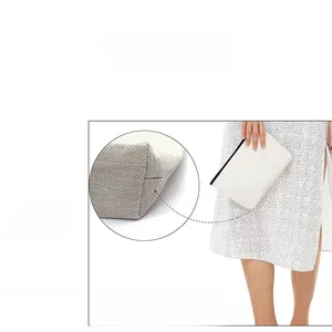 Close-up of woven canvas material with durable zipper and reinforced stitching details