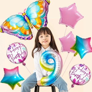 Detail of gradient butterfly balloon set with number 9 and birthday party decorations