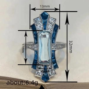 Art Deco ocean style ring with rectangle blue gemstone and silver metal finish