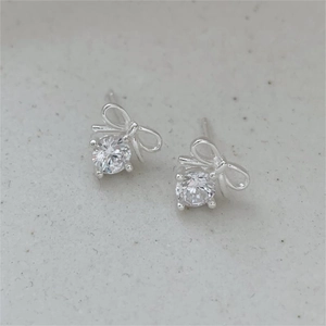 Minimalist 925 silver bow stud earrings with clear sparkling zircon stone settings