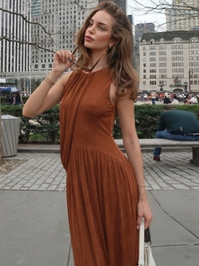 Chic sleeveless rust brown suede maxi dress with pleated crew neck and slim silhouette