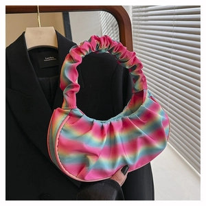 Detailed shot of rainbow gradient pleated handbag with stylish ruched handle design