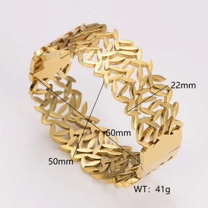 Detail view of gold hollow leaf cuff bracelet with 22mm width and metal texture