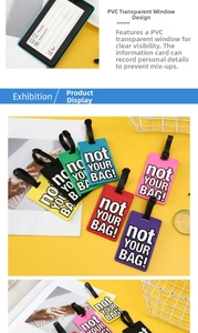 Detail of colorful PVC luggage tags with 'not YOUR BAG!' text and identity card slot