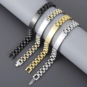 Detail of adjustable stainless steel bracelets with engravable plates in four finishes
