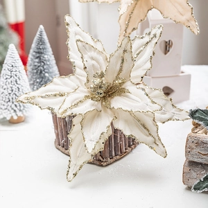 26cm creamy white artificial Christmas flower with gold glitter edges in a rustic basket