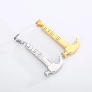 Detailed view of polished gold and silver hammer pendants with realistic metal textures