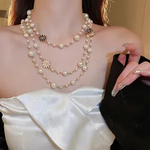 French style double-layer pearl necklace with elegant daisy charms on gold chain