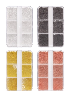 Detailed set of 4 colors nail art micro beads in 6-grid organizers on white background