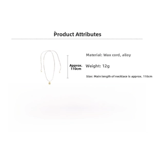Detail view of brown wax cord and textured oval golden alloy pendant on women necklace