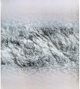 Detail of soft plush round rug with anti-slip non-woven bottom and silky gray tie-dye texture