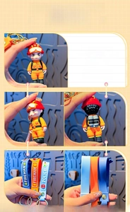 Detailed views of a PVC firefighter keychain with orange uniform and FIREMAN strap