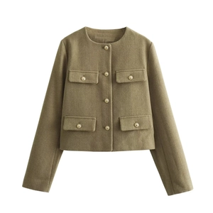 Detailed view of dark olive green cropped tweed jacket with embossed gold metal buttons