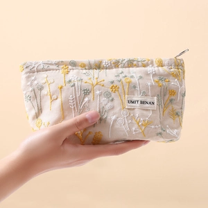 Handheld botanical floral embroidery canvas makeup bag with premium cotton linen texture