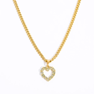 Golden Cuban chain necklace with heart pendant featuring micro-set pavé zircon stones
