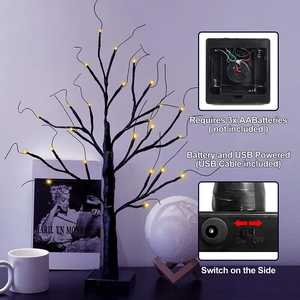 Detail of LED birch tree lamp with battery and USB dual power options and side switch