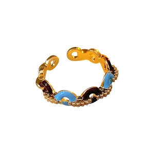 Adjustable gold ring with blue and brown enamel links and cubic zirconia accents