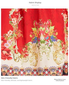 Macro-weergave van de rode stof met bloemenprints en barokke krulpatronen
