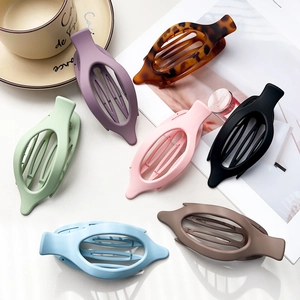 Minimalist matte oval hair claws for women in multiple colors with elegant hollow design