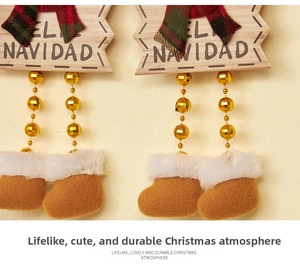 Detail of Christmas beaded ornament with plaid bow, golden beads and Navidad wood sign