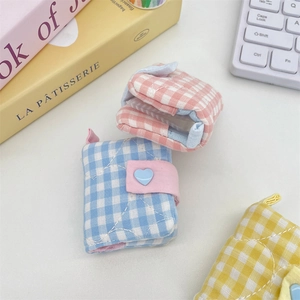 Mini checkered fabric photo albums in blue and pink with heart button and star quilting