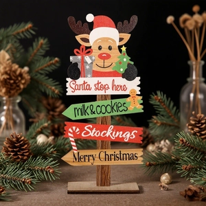 Detail of wooden multi-layer Christmas sign with reindeer and festive inscriptions