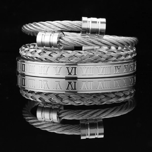 Set di tre bracciali in acciaio al titanio argento con numeri romani e design a cavo