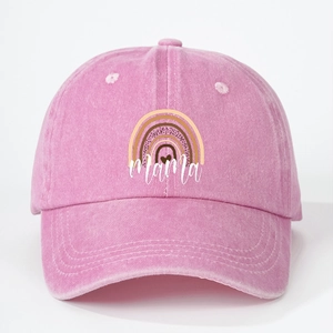 Washed pink cotton baseball cap with rainbow mama print and vintage distressed finish