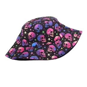 Detail of colorful gradient skull and star print on a black reversible bucket hat